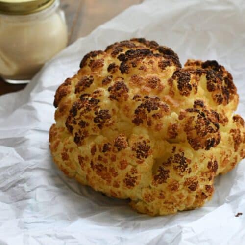 Whole Roasted Cauliflower on parcment paper