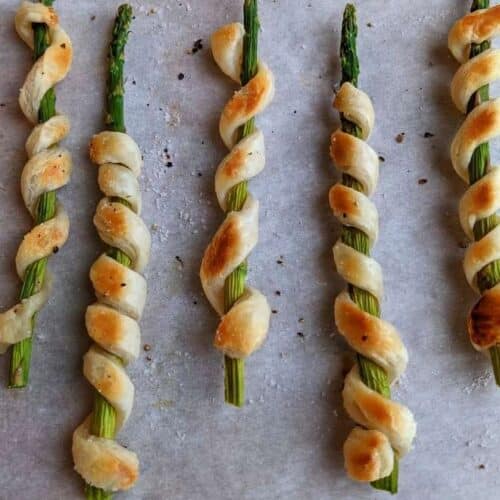 Asparagus Pastry Twists on parcment paper