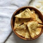 Pita chips in a brown bowl