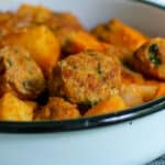 meatballs with sweet potatoes in a white bowl