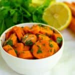 Carrot salad in a white bowl