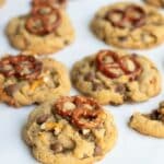 Tahini Pretzel Chocolate Chip Cookies on a white paper