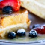 Stuffed Challah French Toast with berries and maple syrup