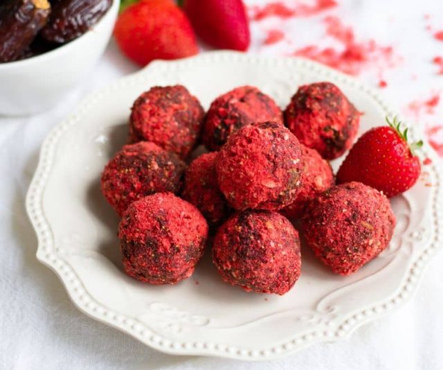 No-Bake Date Strawberry Energy Balls on a white plate